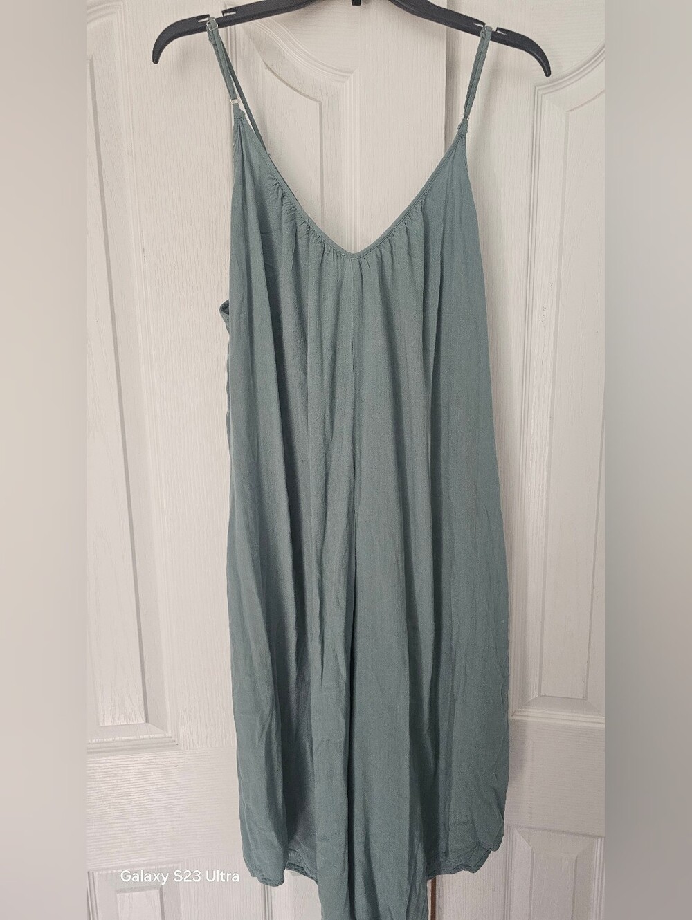 Millibon Loose Fit Jumpsuit in a soft sage green / dusty teal hue.  Size small